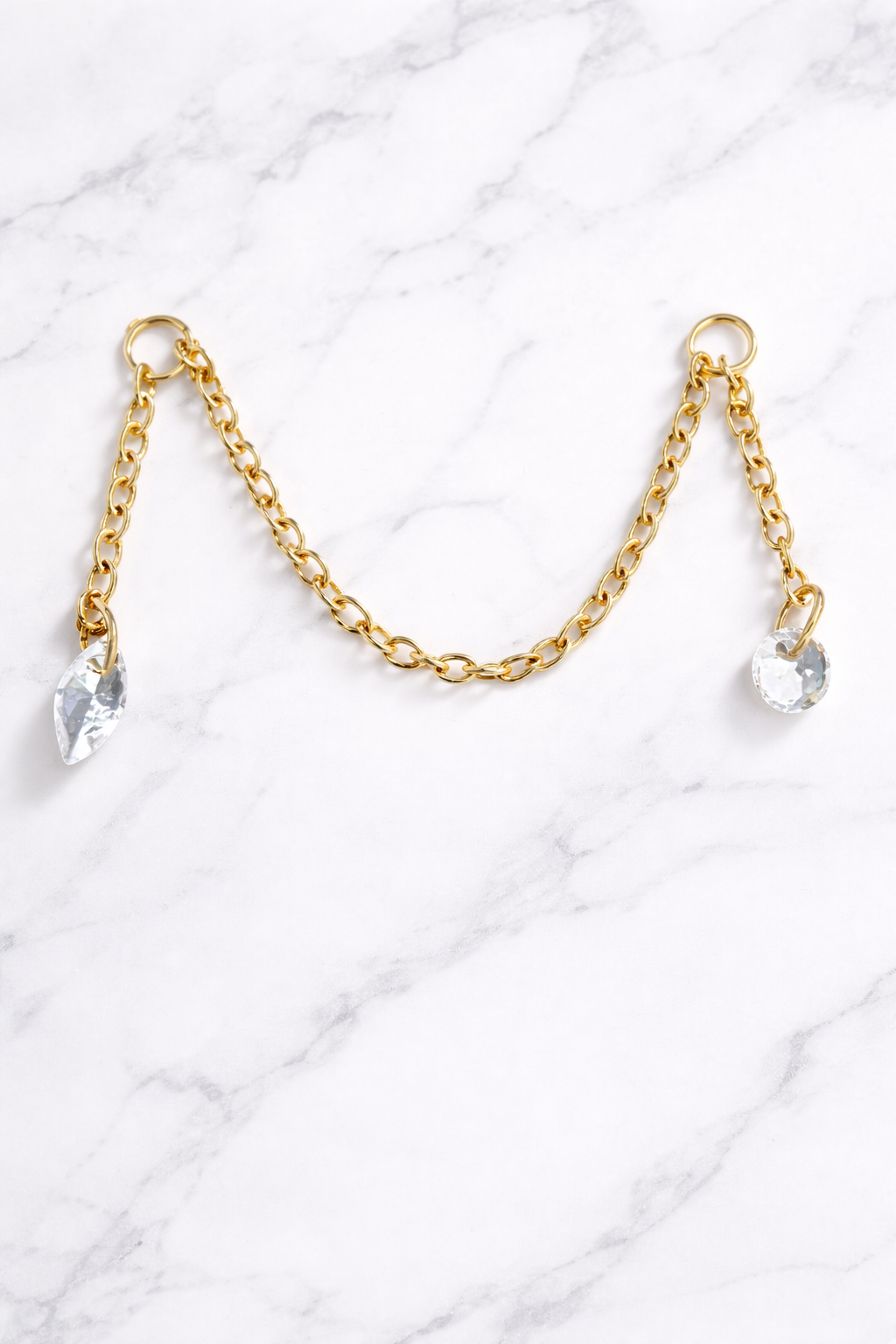 Chaîne d’oreille double zircon – Titane ASTM F136